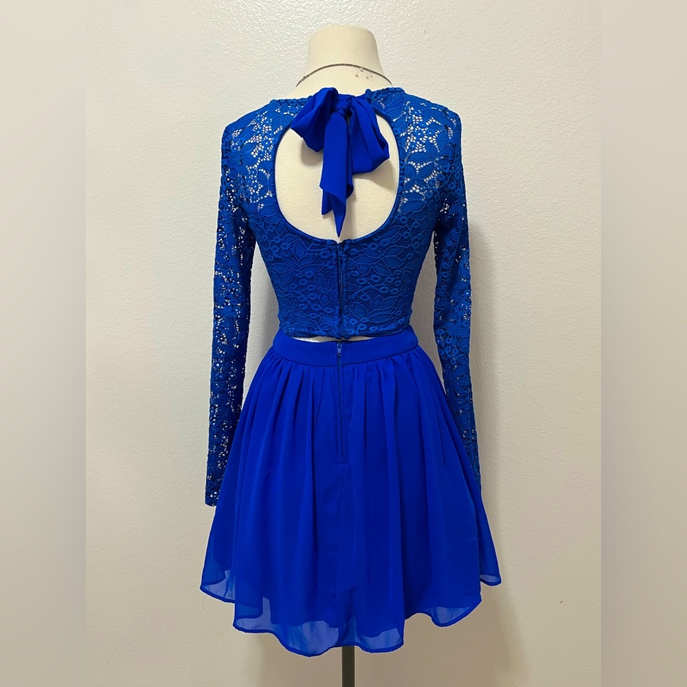 Mini blue skirt with top. Small size. Never used.